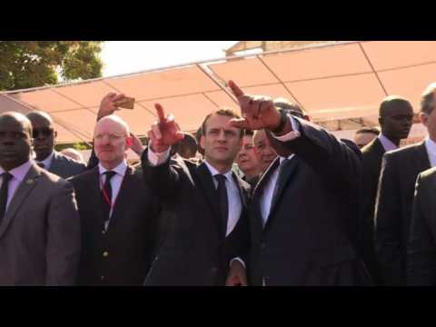 France's Macron visits train construction site in Dakar