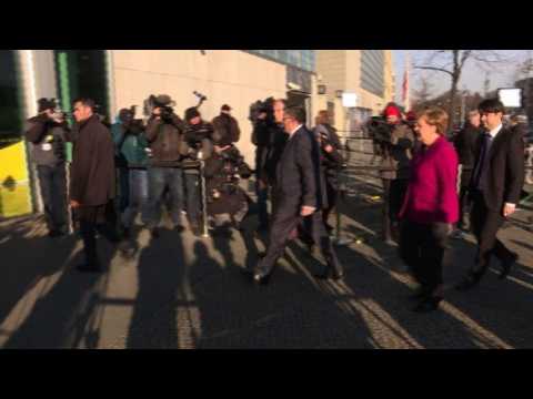 Merkel, Schulz arrive for more coalition talks in Berlin