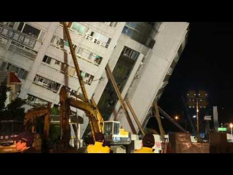 Rescuers scour tilting buildings after Taiwan quake kills six