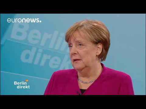 Merkel defends coalition deal on German TV