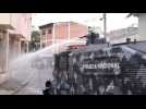 Police fire tear gas and water cannon during protest in Honduras