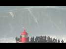 Big wave surfers ride 20 metre waves in Nazare