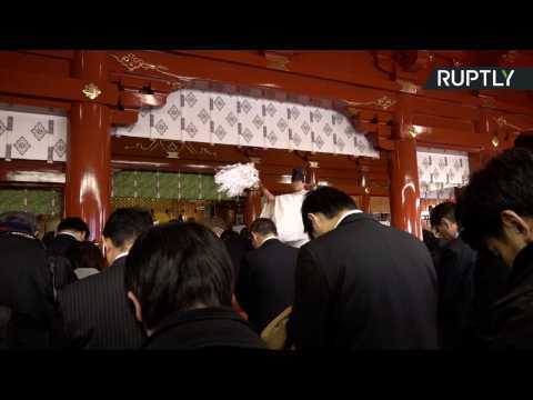Japanese Businessmen Pray to Business Gods for Successful Year