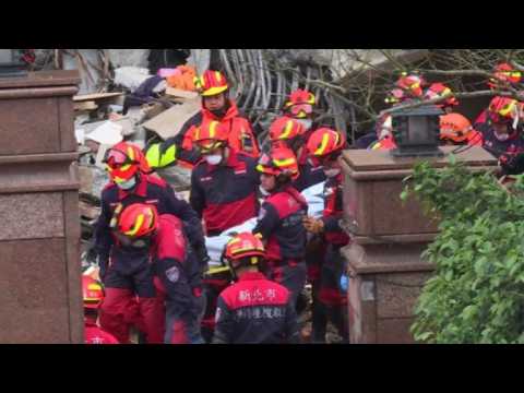Rescuers pull body out of rubble after Taiwan quake