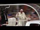 Pope Francis drives through streets of Dublin in Popemobile