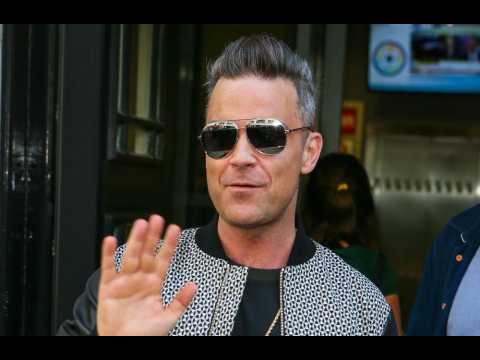 Robbie Williams' daughter 'destined' for showbiz