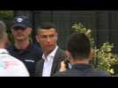 Ronaldo greets fans as he arrives at Juventus for medical check