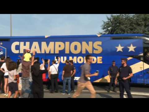 France team bus leaves airport on its way to the Champs-Elysées