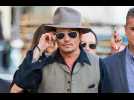Johnny Depp settles with former managers