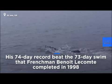 Watch: British swimmer breaks world record for longest staged sea swim