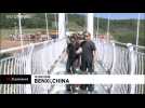 China's longest glass-bottom suspension bridge makes its debut