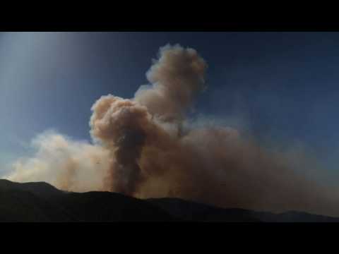 Firefighters battle flames as California scorched by wildfires