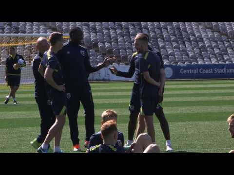 Usain Bolt takes on football as he trains with Aussie team