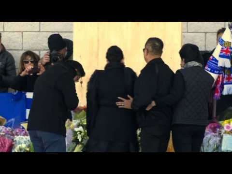 Family of Leicester's Thai boss lays flower at the stadium