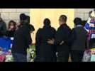 Family of Leicester's Thai boss lays flower at the stadium