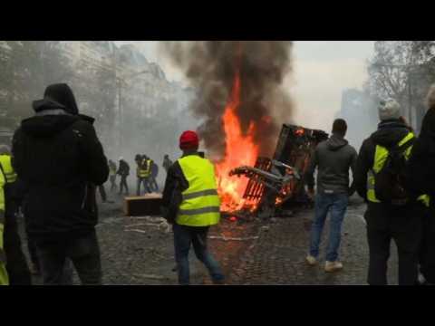Clashes in Paris as French protesters rage against taxes