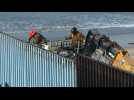 US workers reinforce border wall on Tijuana beach