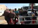 Hundreds of caravan migrants arrive in Tijuana border town