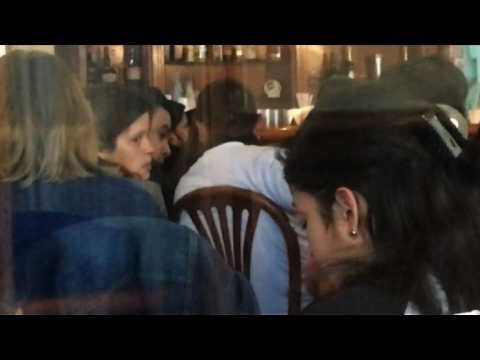 Relatives of Argentina sub crew members watch news of wreckage