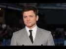 Taron Egerton thinks he's a better archer than Jennifer Lawrence