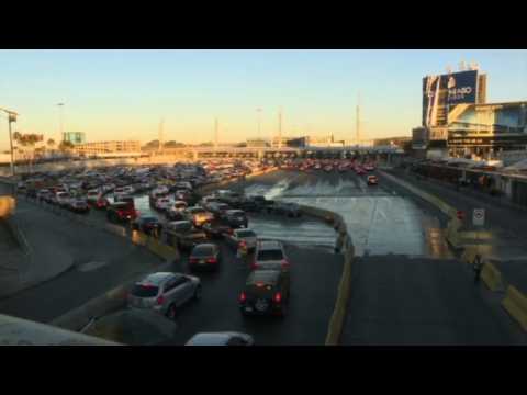 Cars pass through US-Mexico border after temporary closure