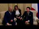 Italian PM Conte shakes hands with Libya's Haftar