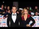X FACTOR EXCLUSIVE: NO war with Robbie and Ayda