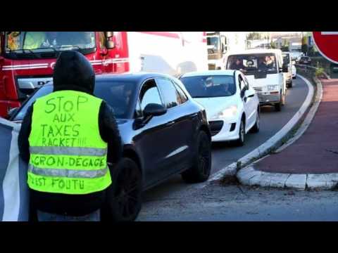 French anti-fuel hike protesters block access to petrol station