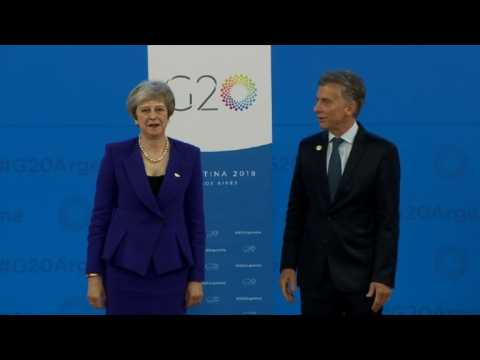 UK PM May greets Argentine President at G20 welcome ceremony