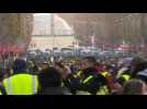 "Yellow vest" protesters march down the Champs Elysees