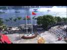 Hong Kong raises flags to mark 20th anniversary of handover