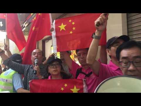 Protests in Hong Kong as Xi swears in new leader