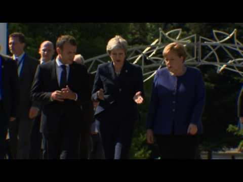 Merkel, May and Macron walk to summit in Sofia