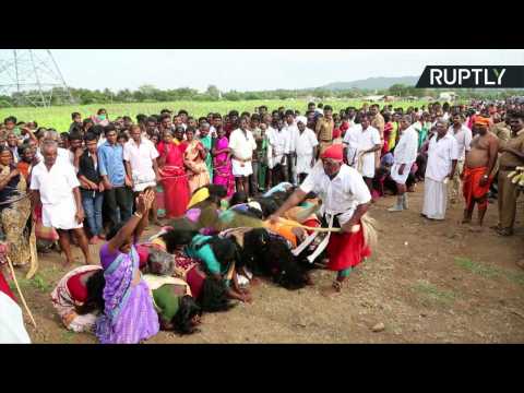 Indian Women Line Up to Get Whipped By Priests to Cast Away Evil Spirits