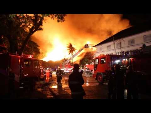 Blaze guts historic teak wood Yangon hotel