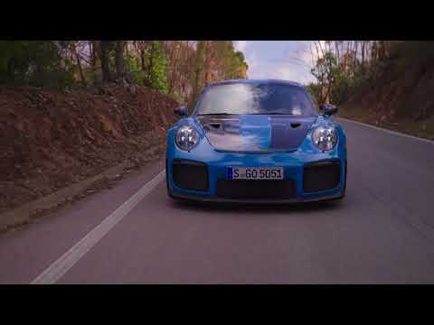 Porsche 911 GT2 RS in Miami Blue Driving on the road