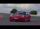 Porsche 911 GT2 RS in Guards Red Driving on the track