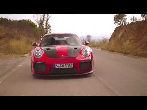 Porsche 911 GT2 RS in Guards Red Driving on the road