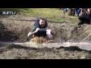 Couples Compete for North American Wife Carrying Championship