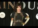 Joan Collins hid in a wardrobe to escape producer's advances