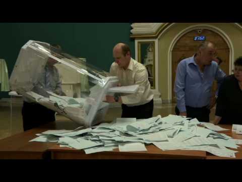 Officials count Russian presidential elections votes