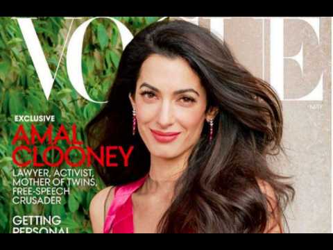 George Clooney fascinated by wife Amal