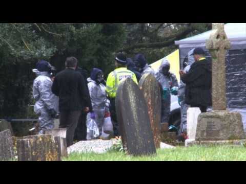 Police activity continues at grave of posioned spy's wife, son