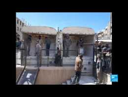 Shelling continues as convoy delivers food to besieged Syrian enclave