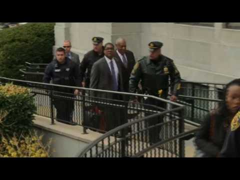 Bill Cosby arrives at court for retrial