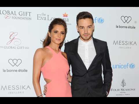 Liam Payne supports Cheryl's charity work