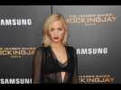 Jennifer Lawrence insists it was her decision not to cover up her revealing Versace dress