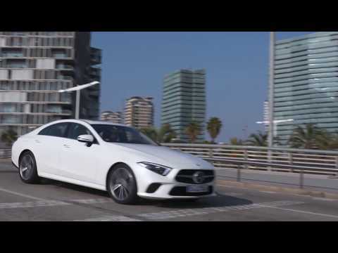 Mercedes-Benz CLS 350 d 4MATIC in White bright Driving in the city