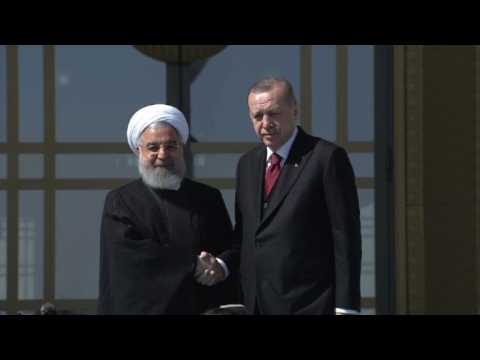 President Erdogan greets Iran's Rouhani in Ankara
