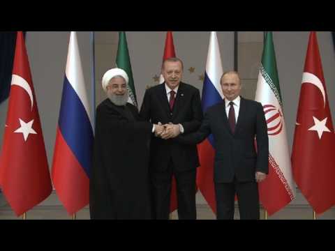 Iran, Russia, Turkey leaders begin summit on Syria: family photo
